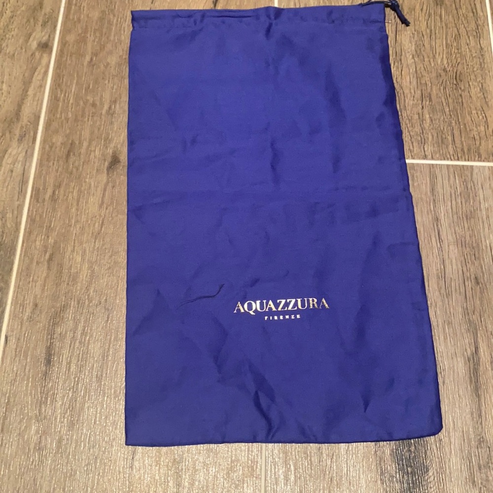 Dust bag. Great for storing shoes and bags